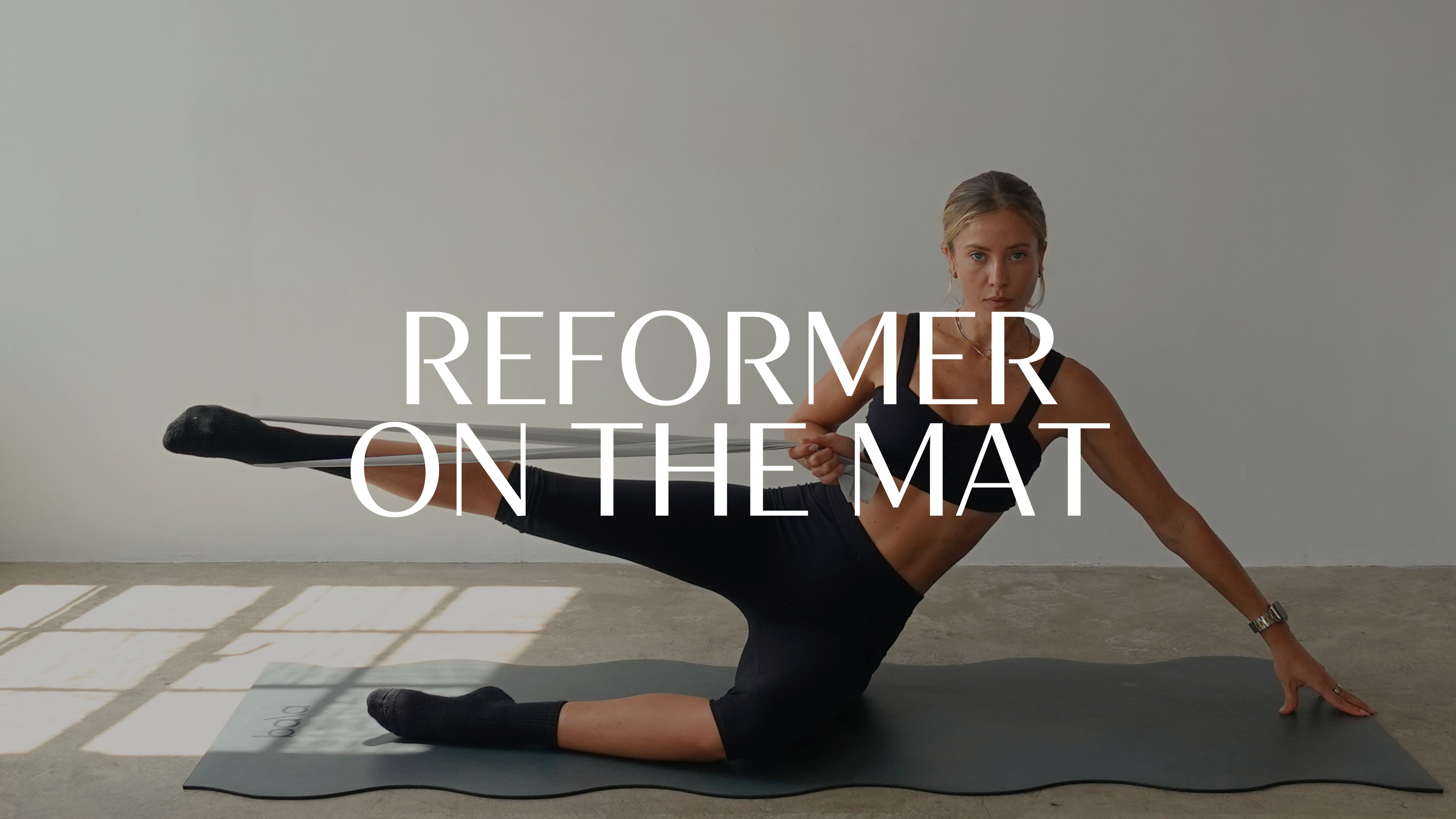 REFORMER ON THE MAT
