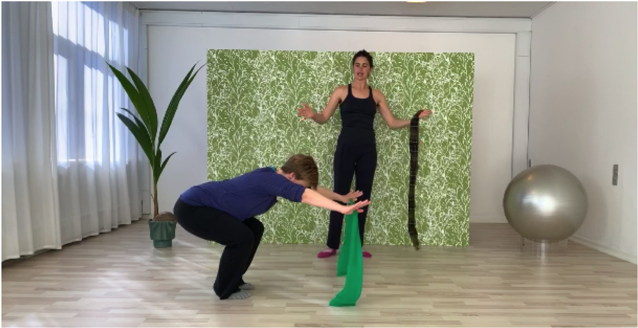 Stående Pilates med elastik eller tørklæde