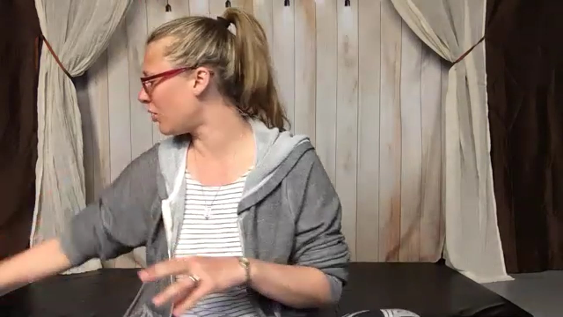 Raleigh on a Pilates Mat with a Thera Band, Weights, and Ball