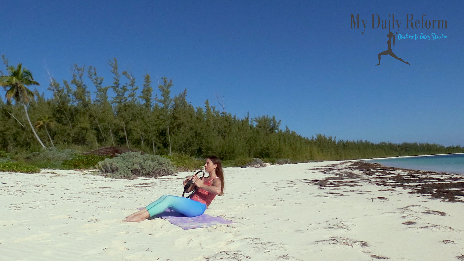Pilates Mat Fitness Circle on the Beach