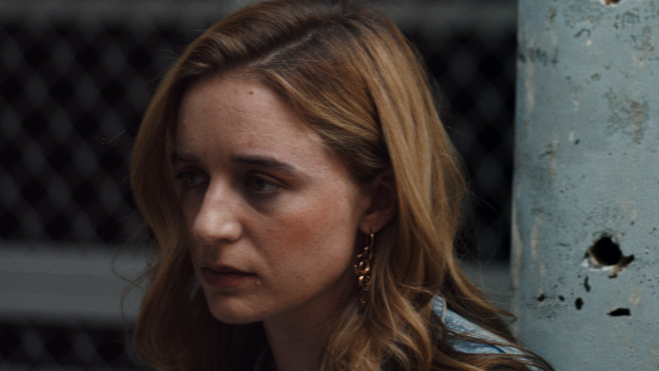 An Athlete Wrestling a Python