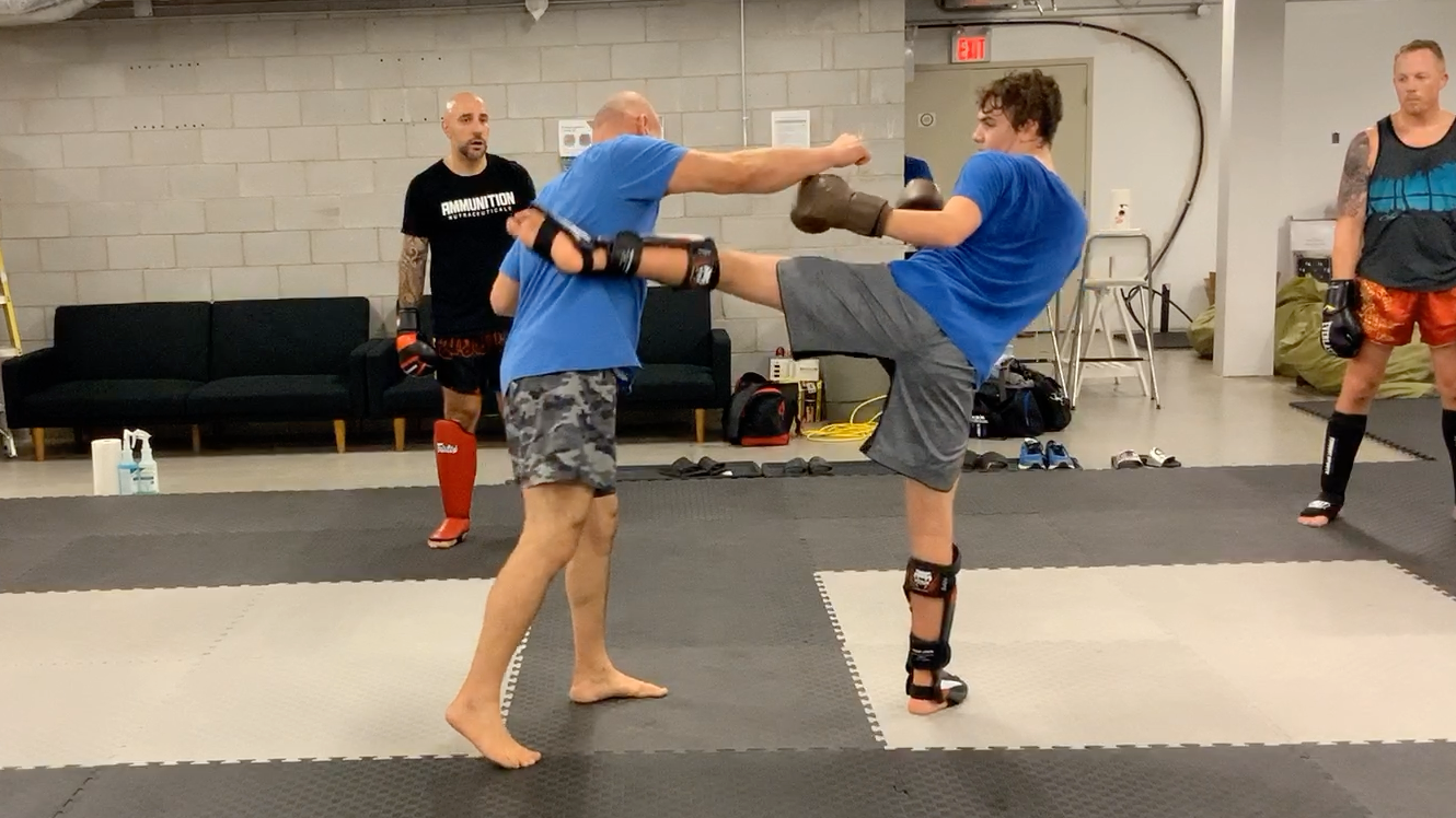 Muay Thai Fundamentals White Shorts:Stripe 2-Lesson 4 Switch round kick to body