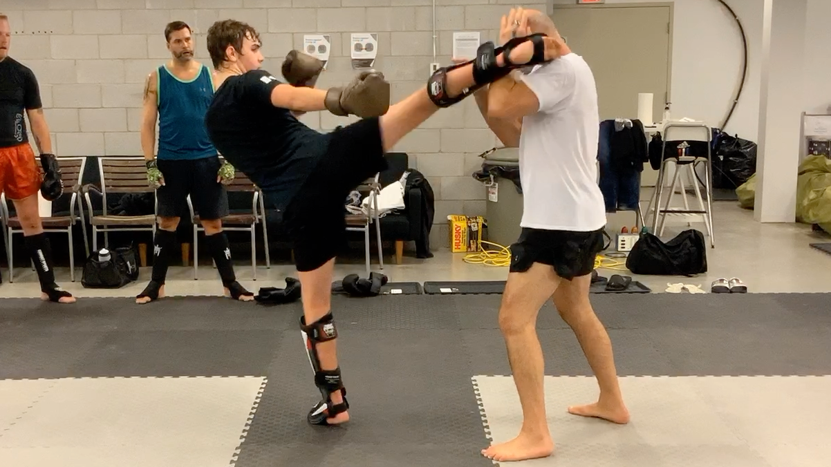 Muay Thai Fundamentals White Shorts:Stripe 2 Lesson 7 Head Kick defense