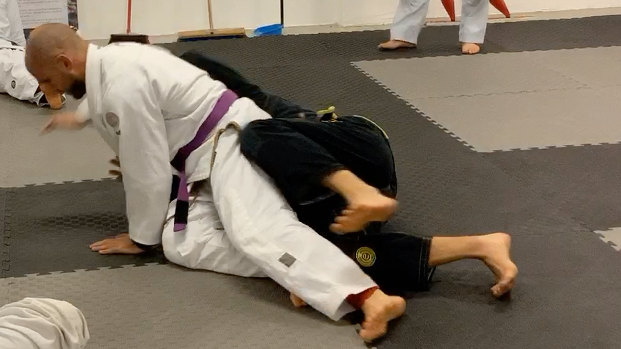 Escaping Negative Bottom:Under hook to double knee push