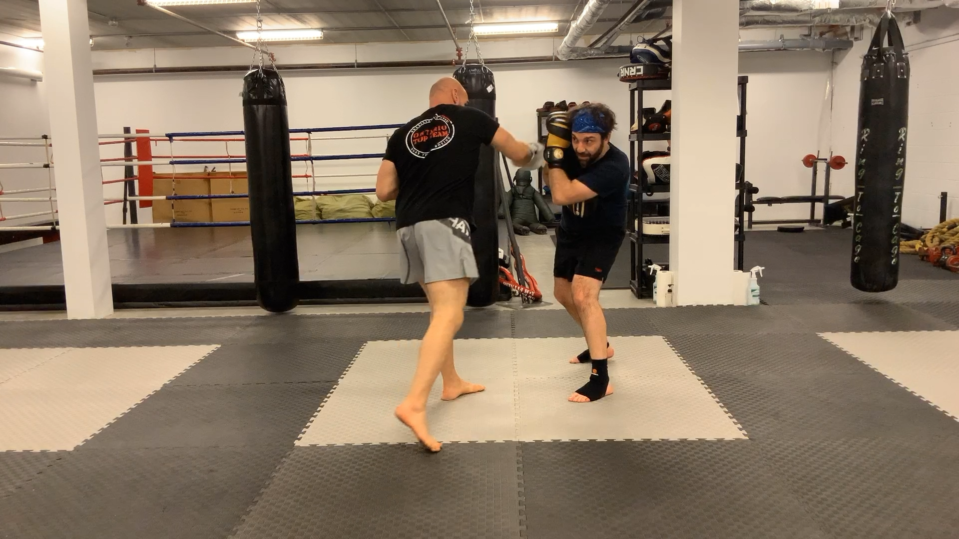Muay Thai White Shorts:Stripe 3 Lesson 2 Slip and Cover the Cross