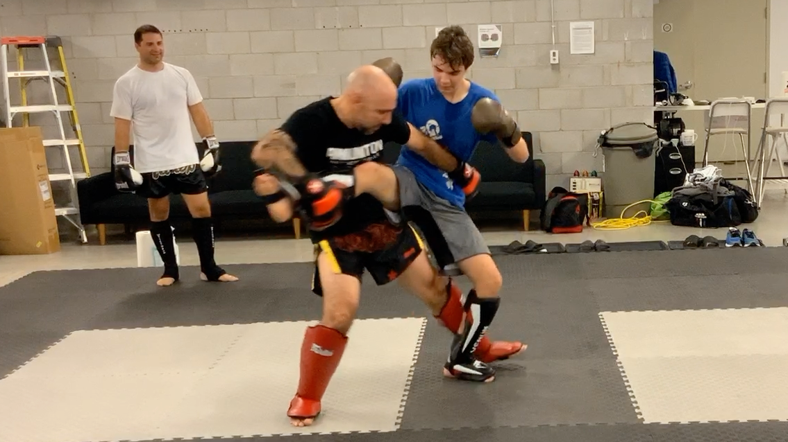 Muay Thai Fundamentals White Shorts:Stripe 2 Lesson 3 Ride to Catch and Sweep
