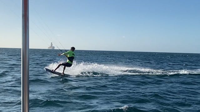 Kite surfer over the water