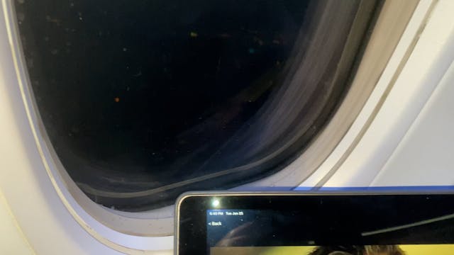 In the plane flying back to NYC