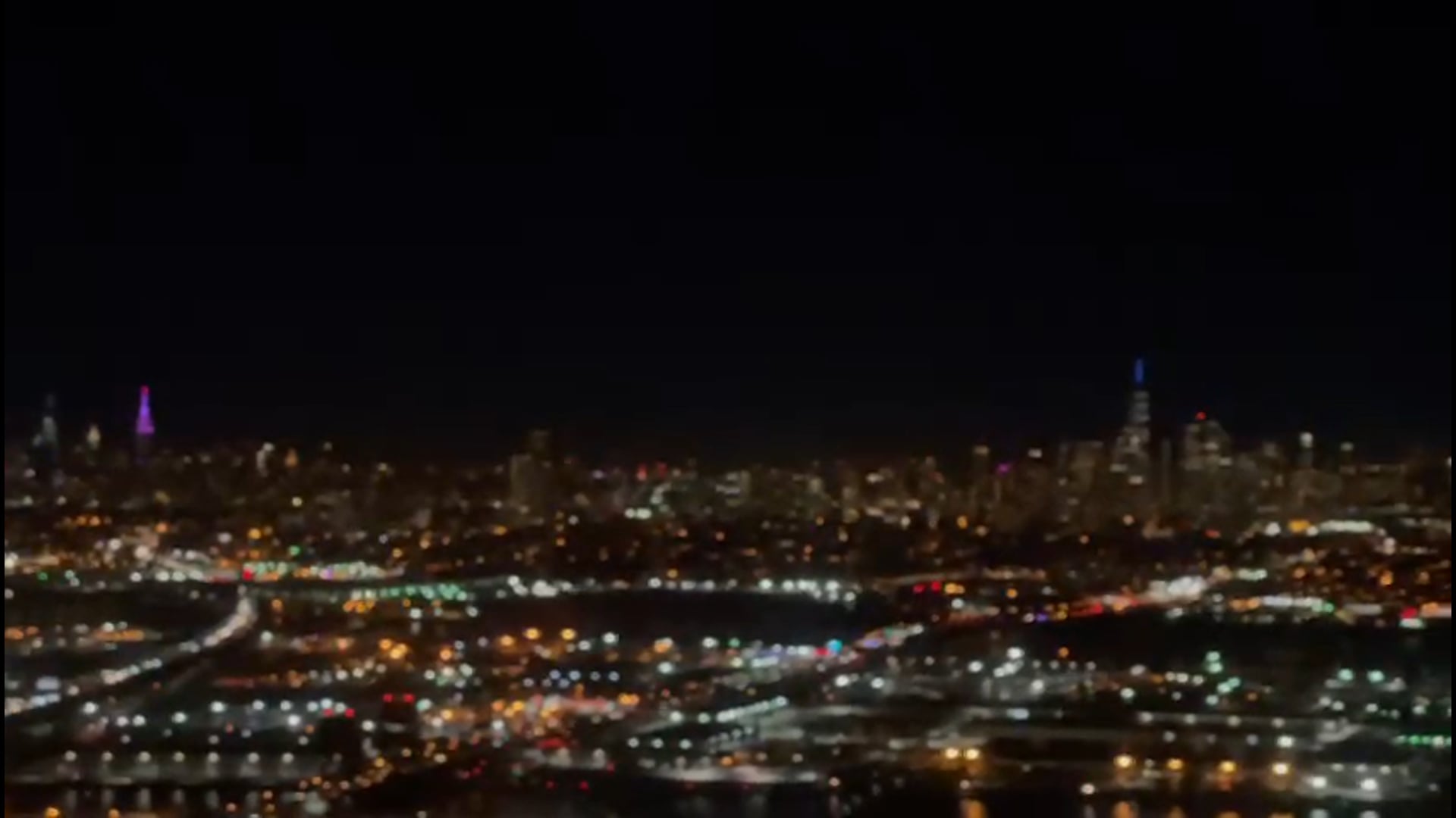 Night landing with view of the big apple