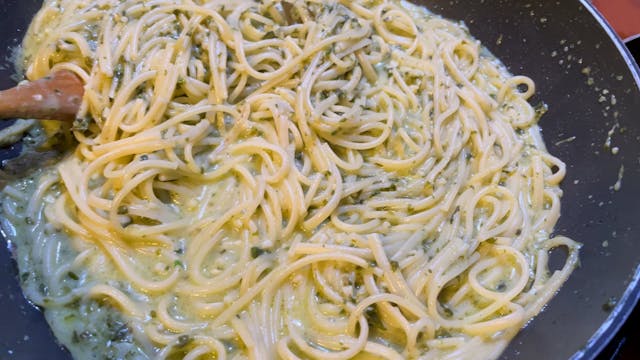 Pasta in a creamy spinach sauce with ...