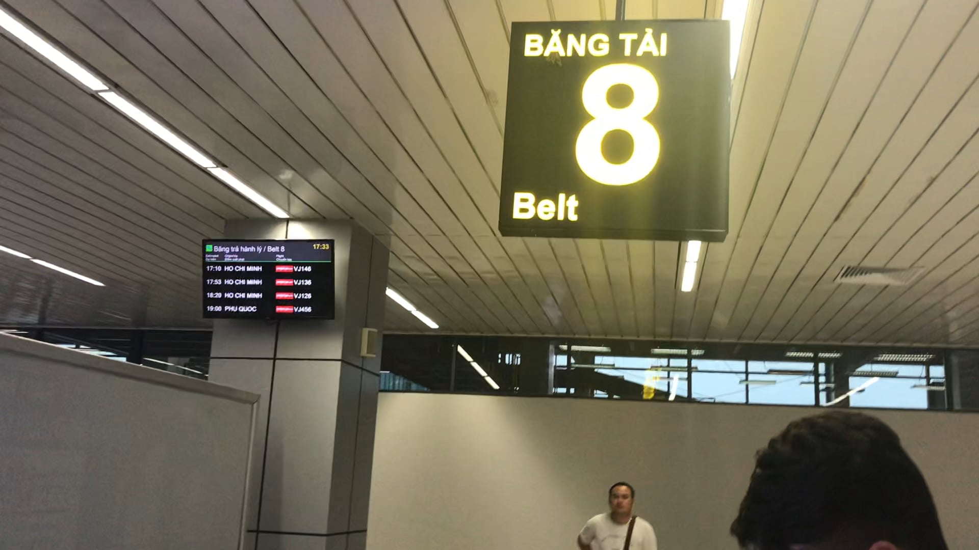Picking up the luggage at Hanoi airport