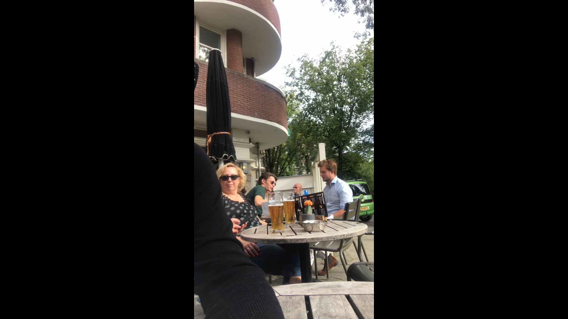 On a terrace in Amsterdam, they smoke you out