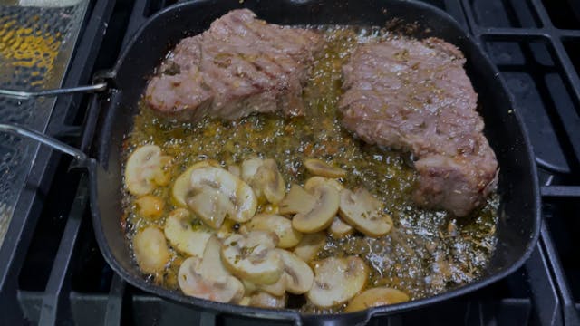 Steak with  mushrooms