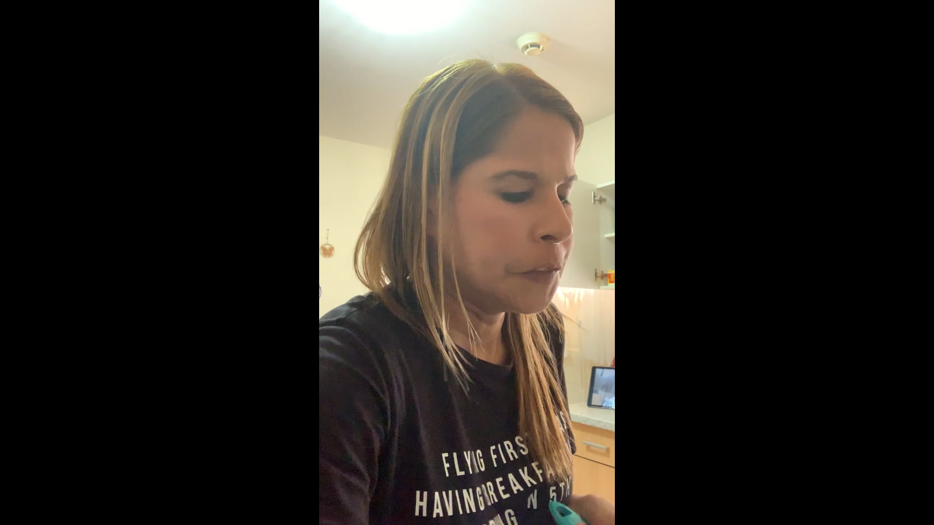 My sis on the phone while I cook