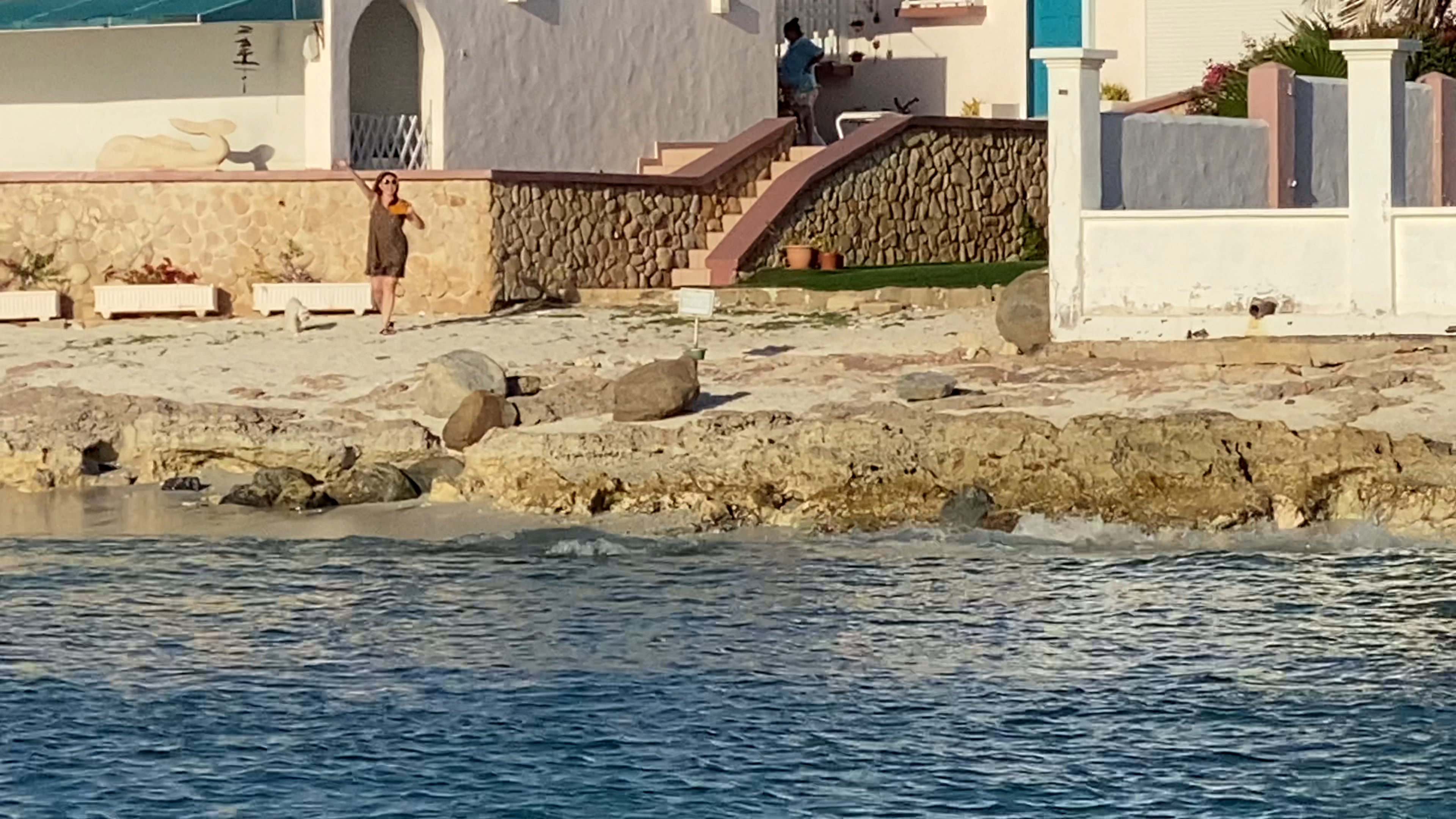 There is the owner of that house waving at us