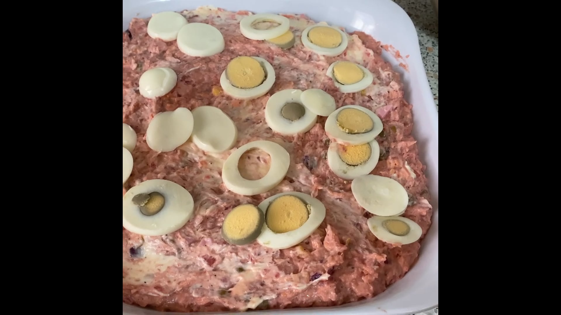 Pink potato salad with poached salmon