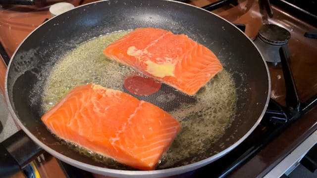 Salmon in a creamy turmeric sauce