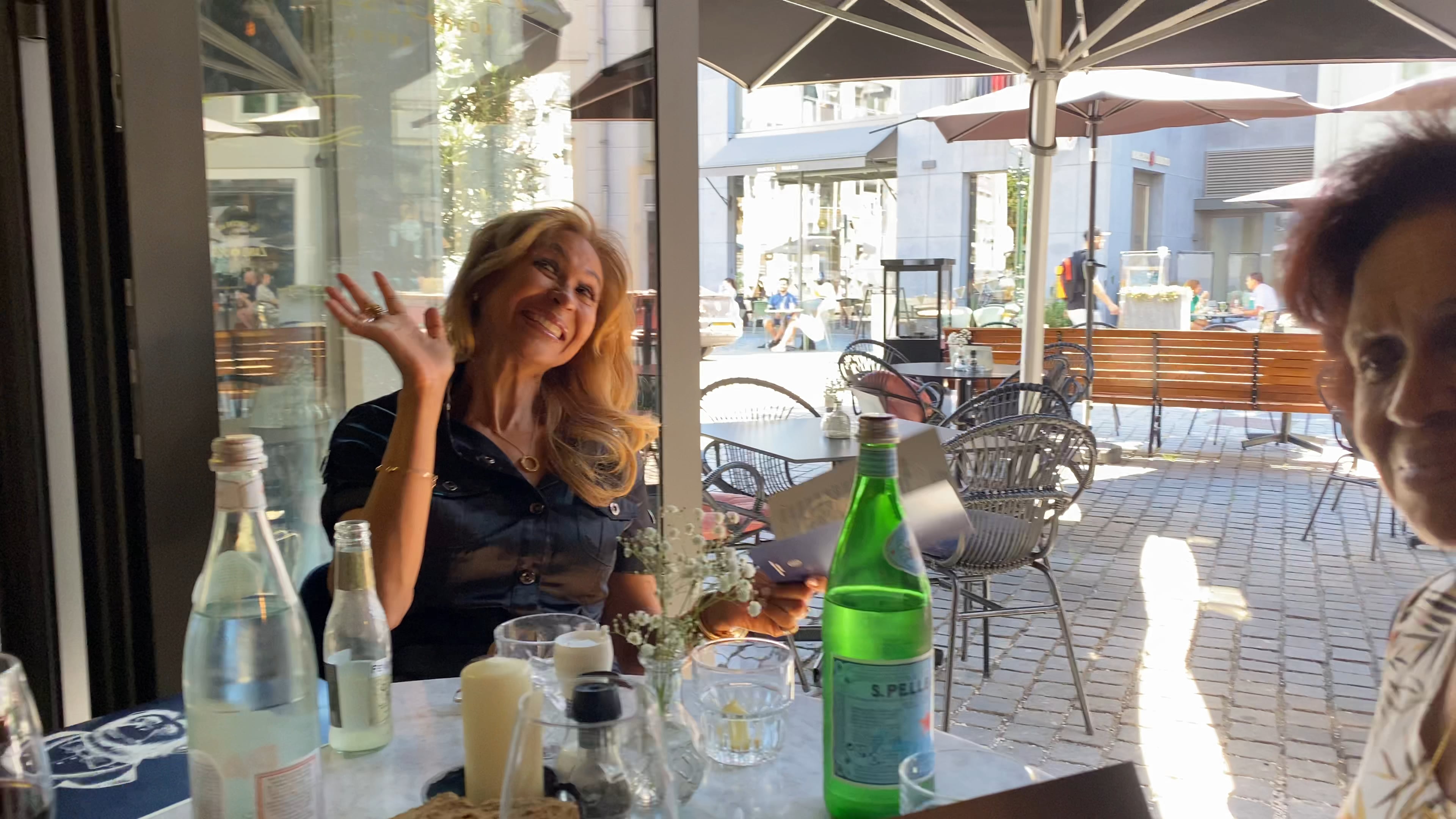 On a terrace with Many and her mom