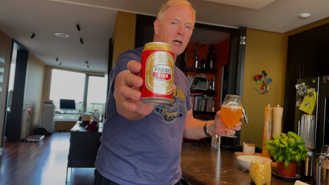 Hubby with his Surinamese beer