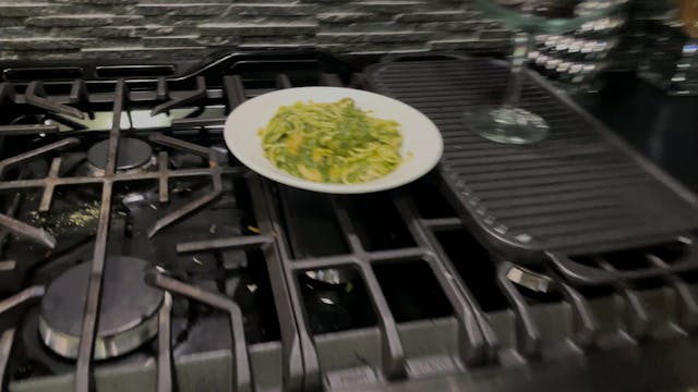 Pasta with a green sauce and Mahi mahi