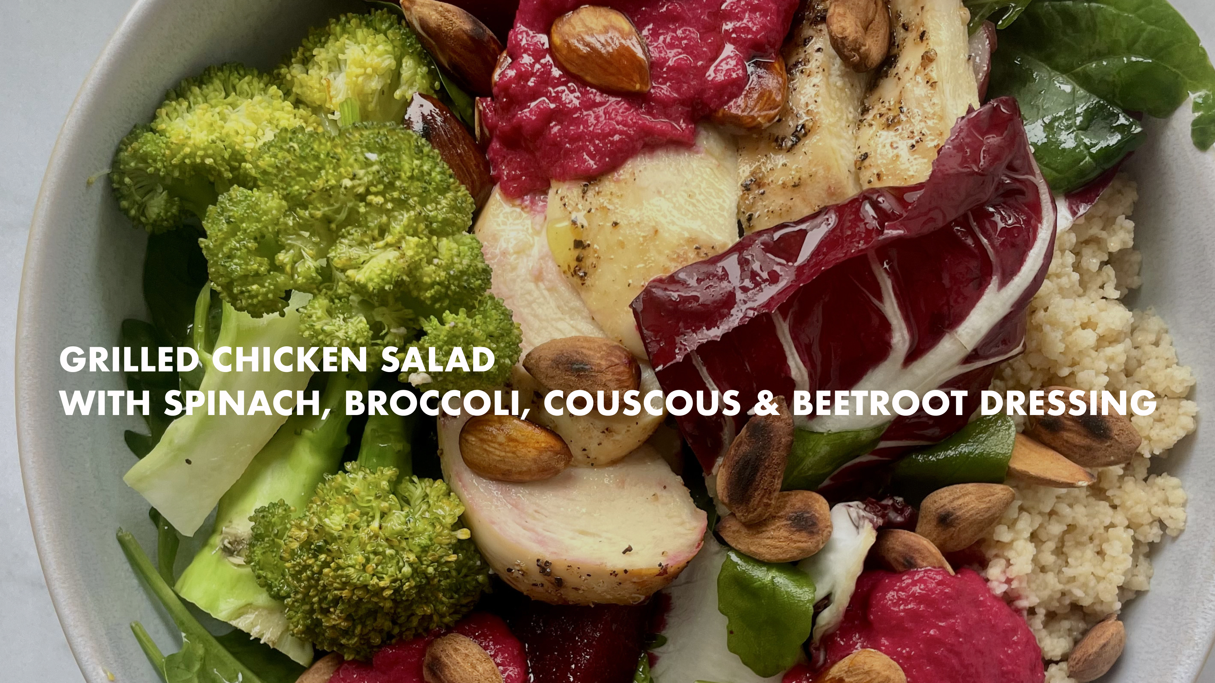 Grilled chicken salad with spinach, broccoli & couscous