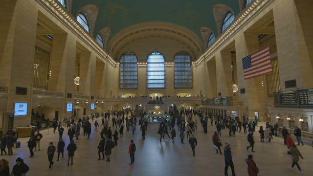 Slow Motion Wide Shot of People Walki...