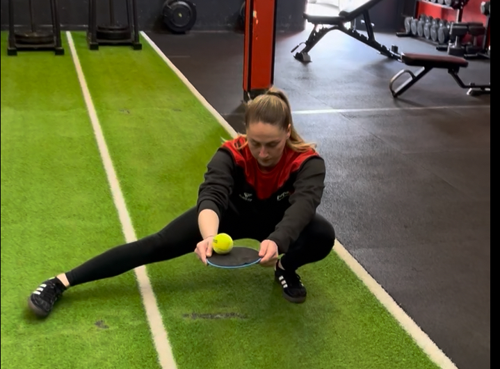 Cossack Squats with Ball Balance 