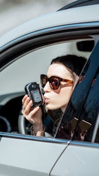 How do breathalysers work?