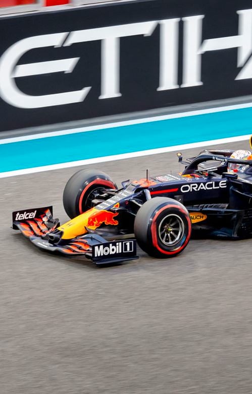 What is the function of the front wing on an F1 car