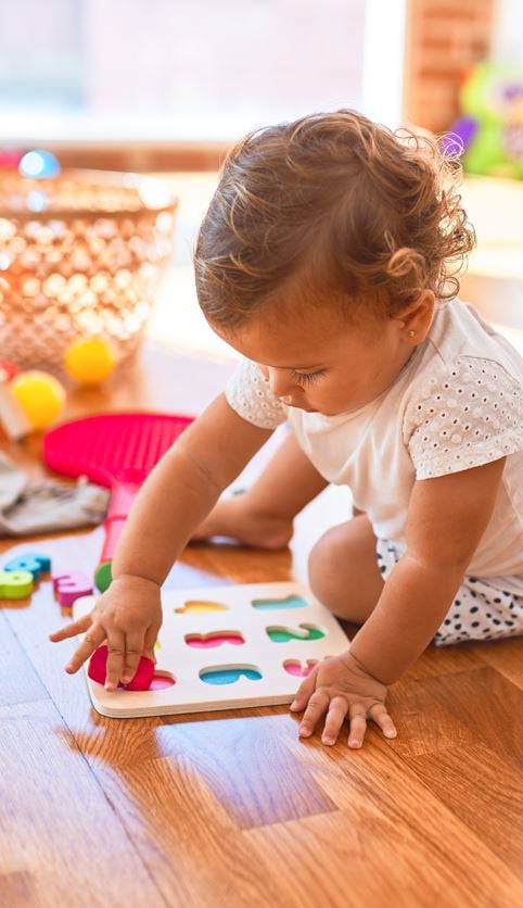 Why do young children like doing puzzles?