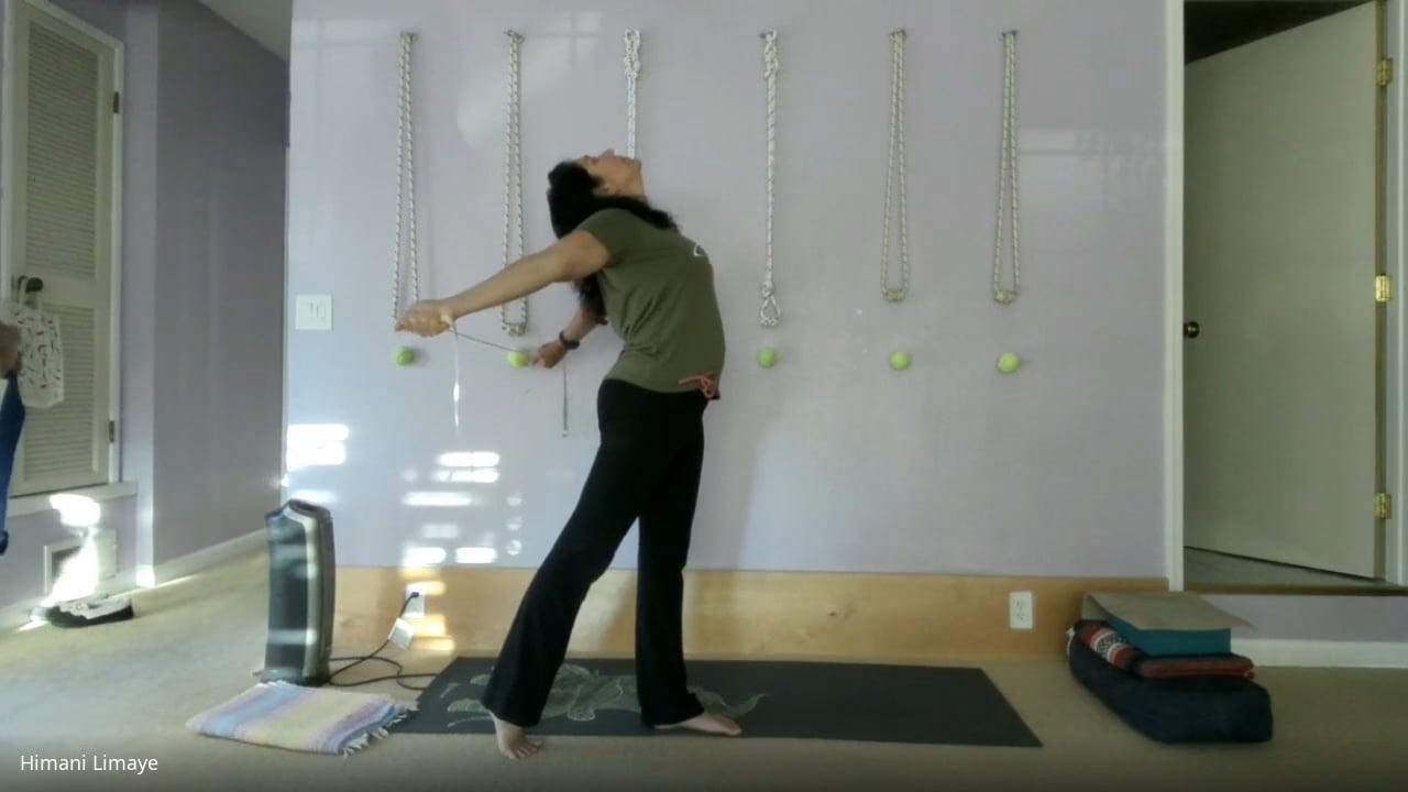 Arms stretches using a strap
