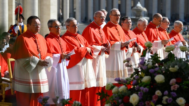 Pope Francis greets new cardinals after opening Mass for Synod