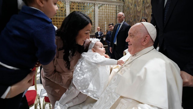 Pope Francis baptizes 16 children in the Sistine Chapel