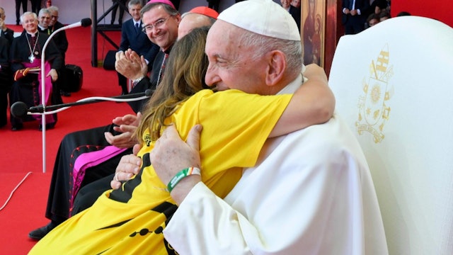 Young people give the Pope a bracelet with names of people in hospitals, prisons