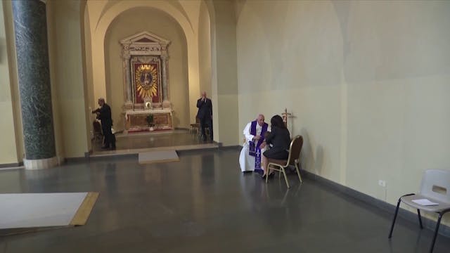 Pope Francis hears confession in a lo...