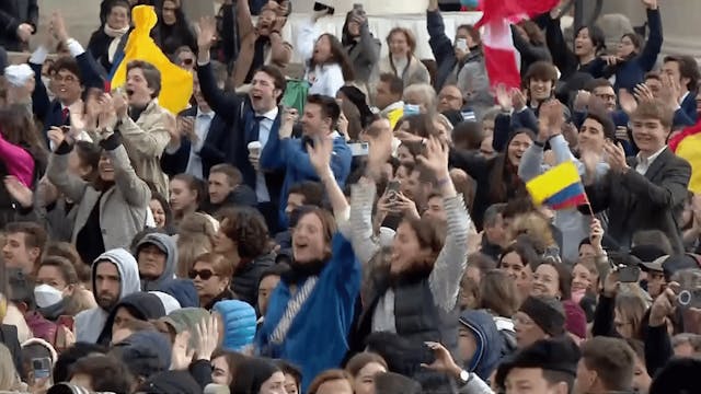 Pope Francis greets young people from...