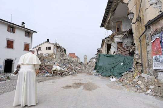 Pope Francis prays for the victims of...