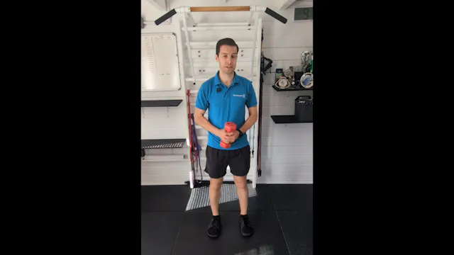 Unilateral dumbbell squat and shoulder press