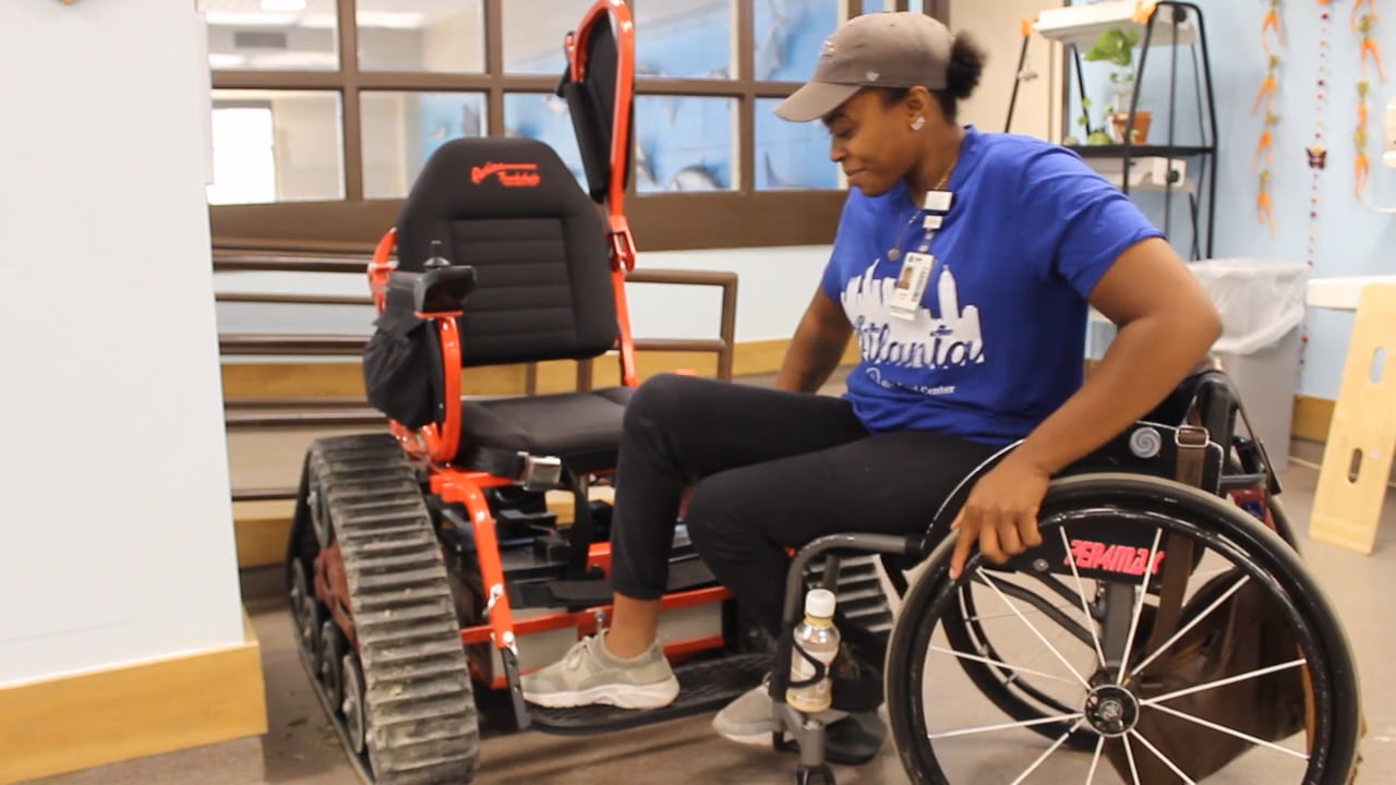Outdoor Track Chair Transfer Demonstration (L1 Para)