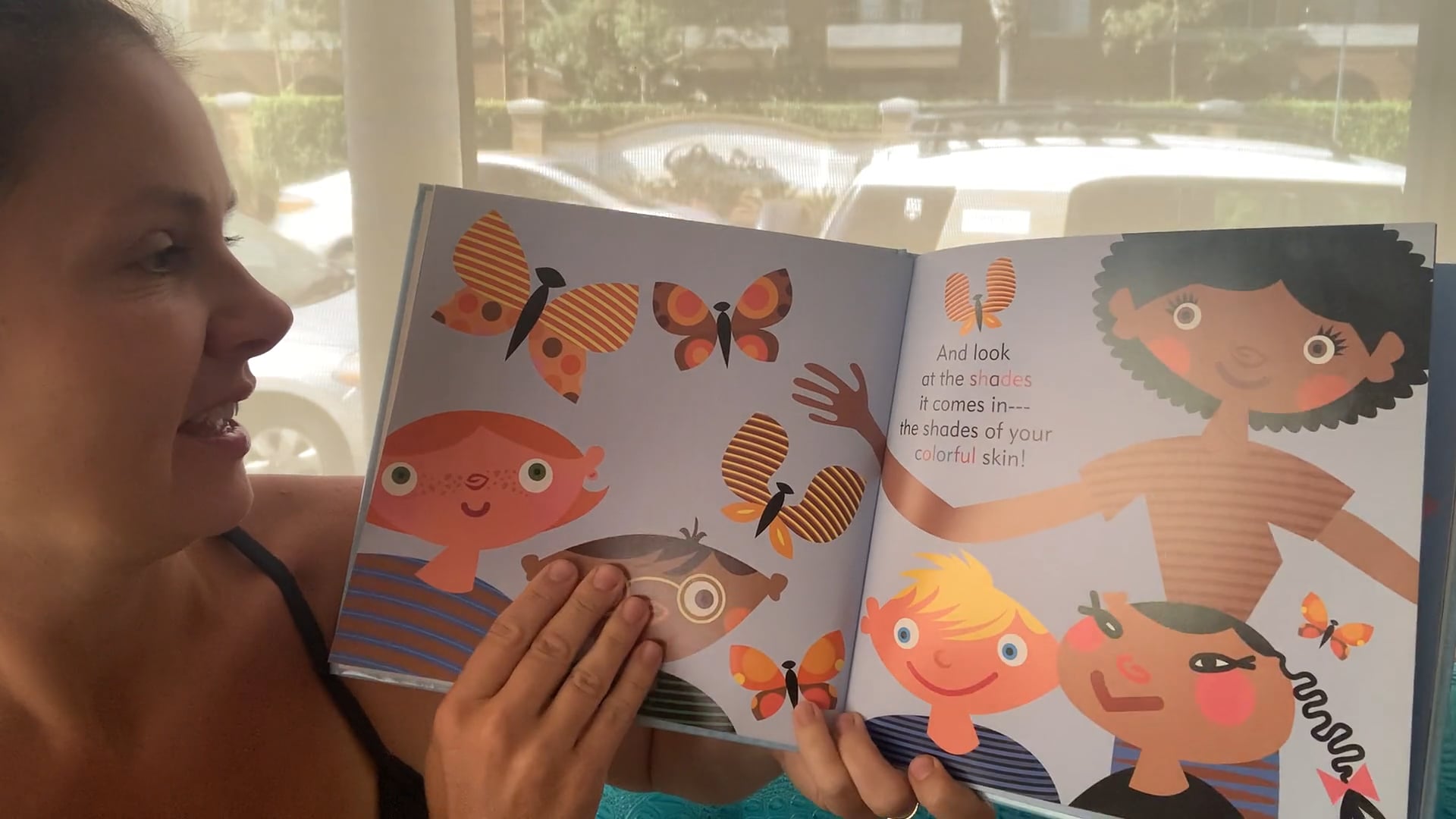 Miss Sophie reads “The Skin You Live In”