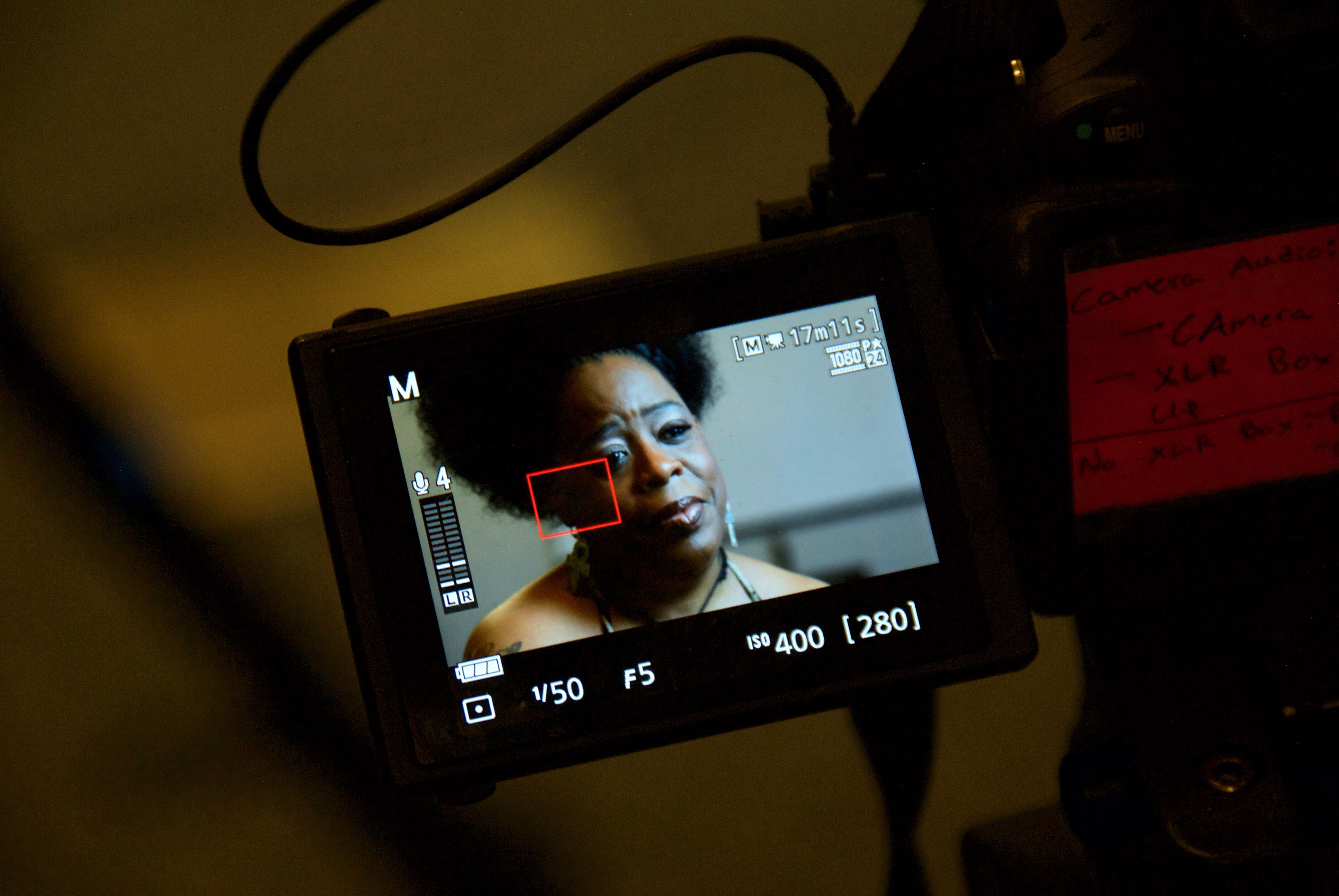 UP*_Priced.Out.Production.Still.Intv.Michelle.Lewis.In.Camera.jpg