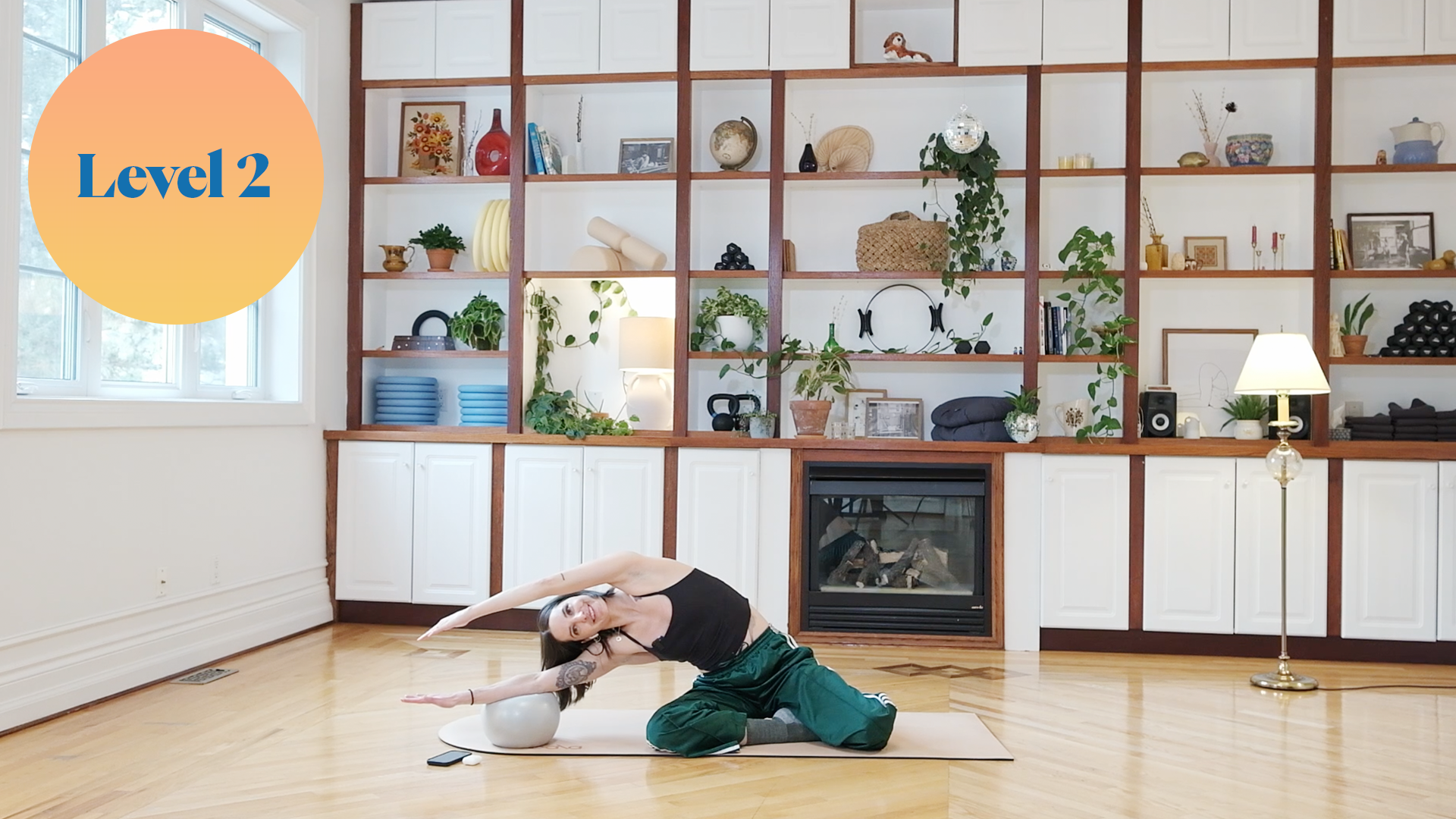 QB Mat Pilates (Rotation, Core and Glutes with the Squish Ball)