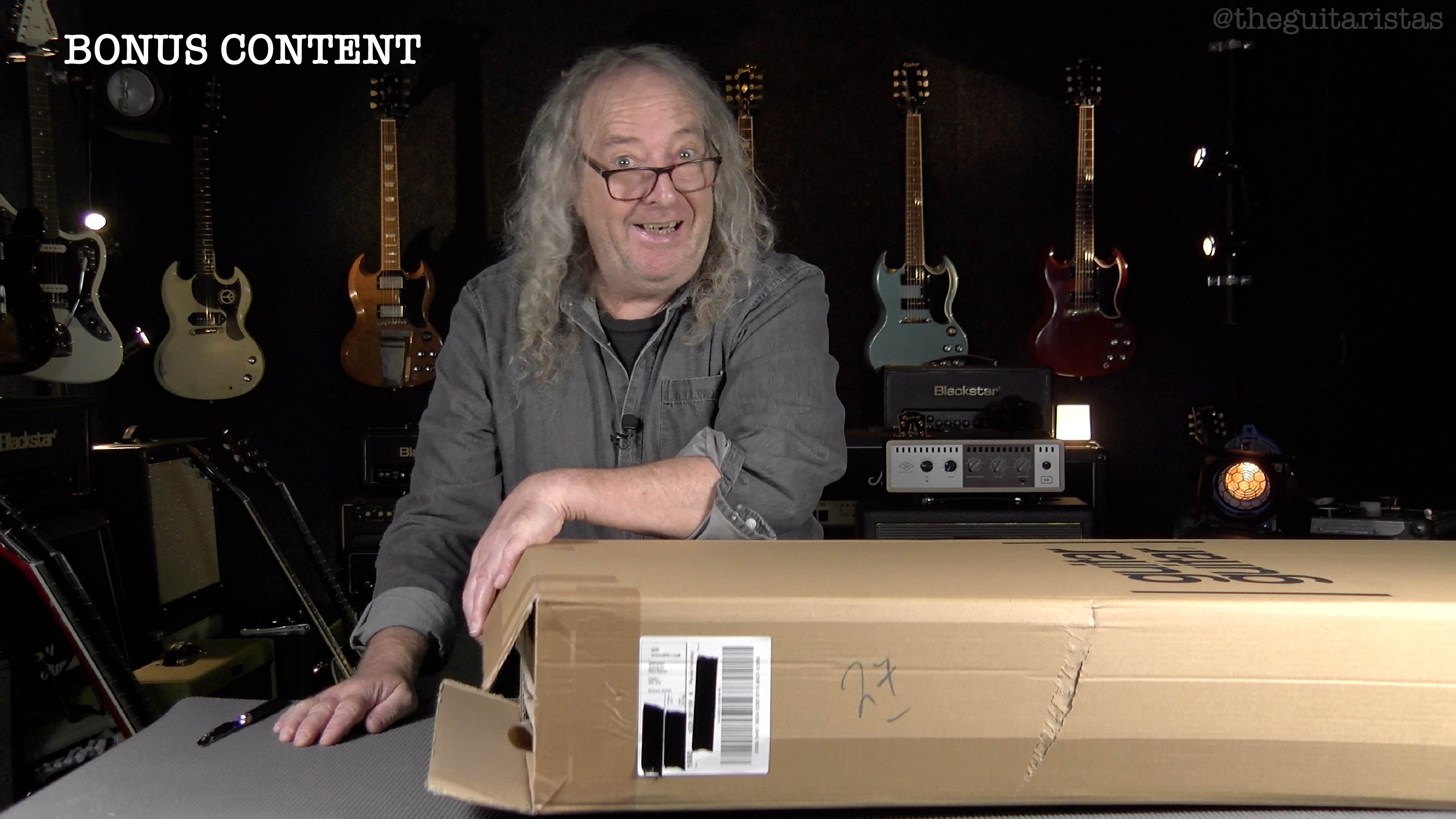 Opening a mystery package from Australia and unboxing another Guitar Guitar!! 