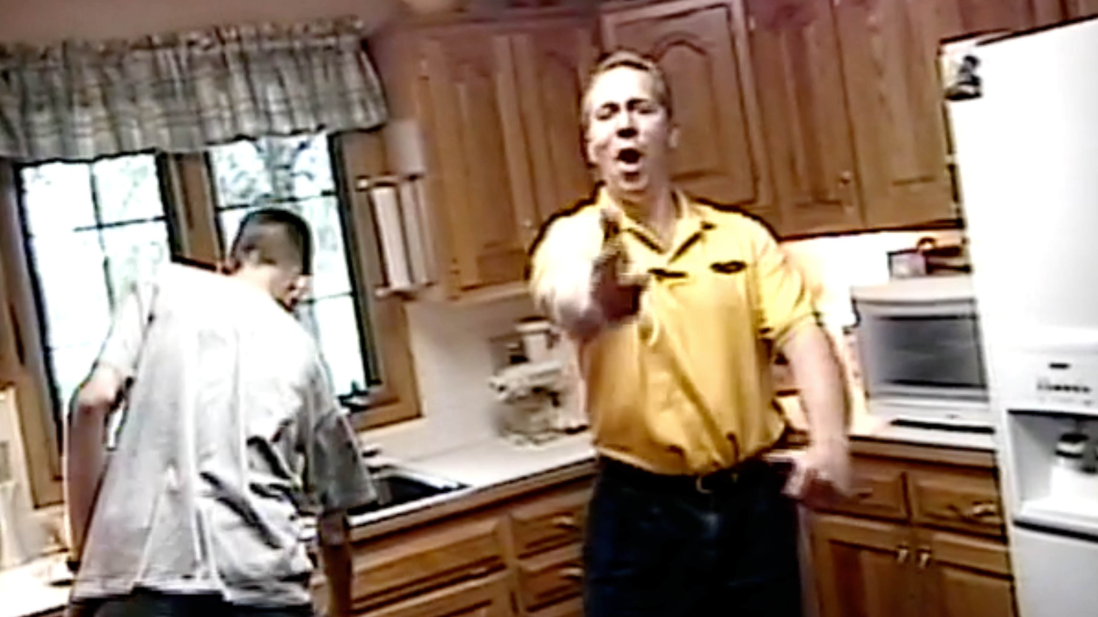 Dad Dances in Kitchen