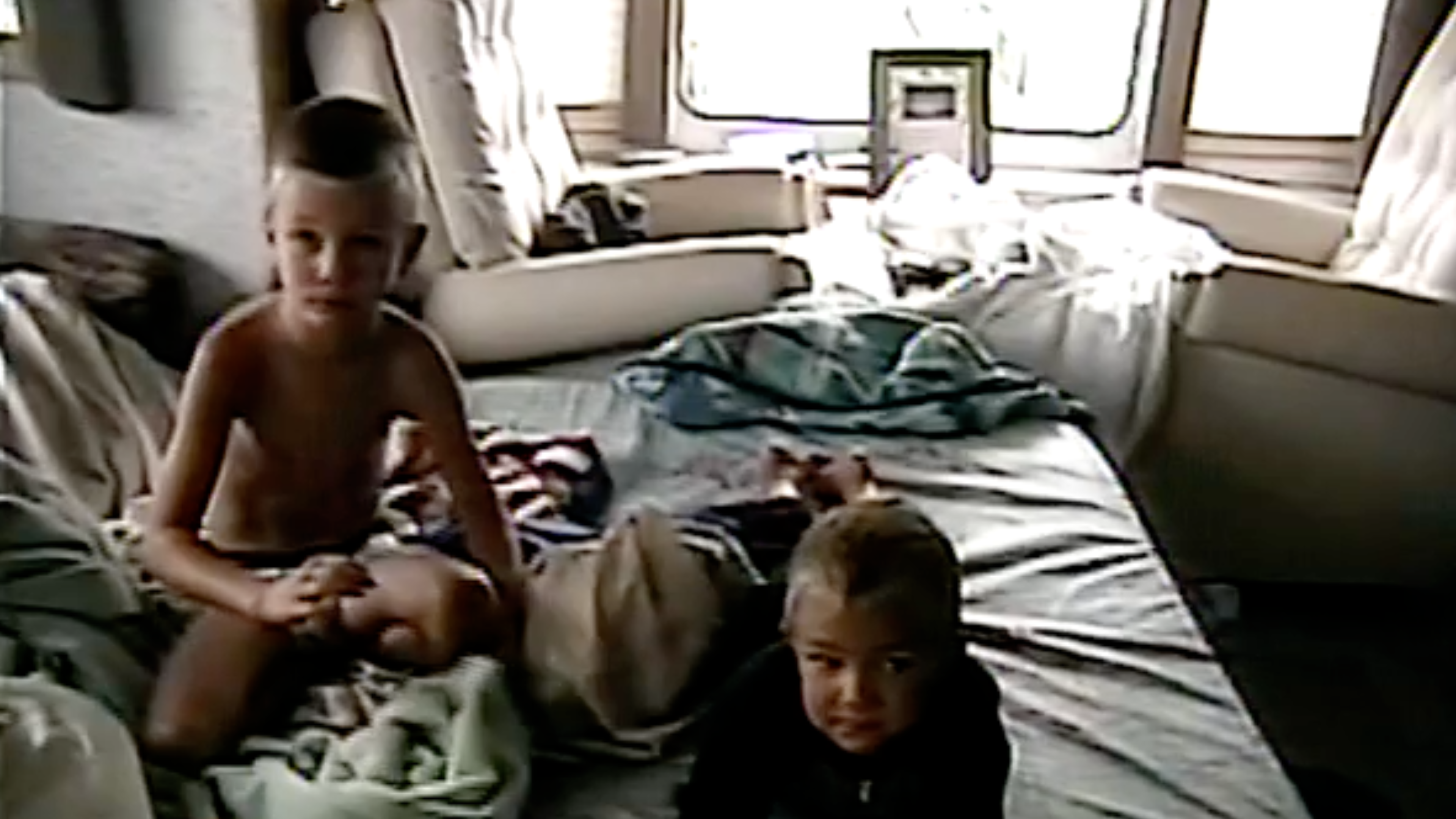 Andrew and Taylor in the Camper