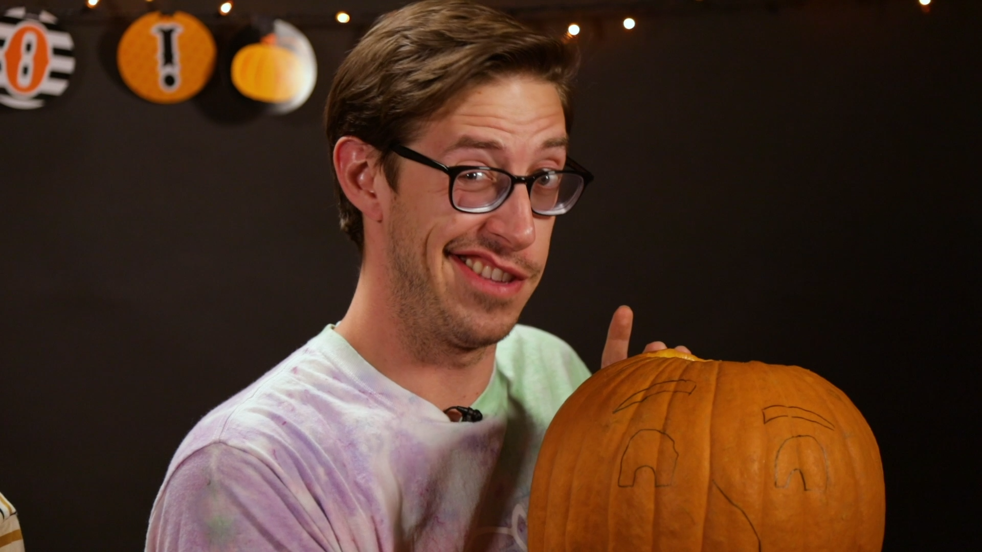 Carving Each Other's Faces On To Pumpkins