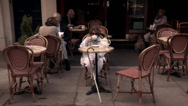 Still: Peggy Outside Cafe