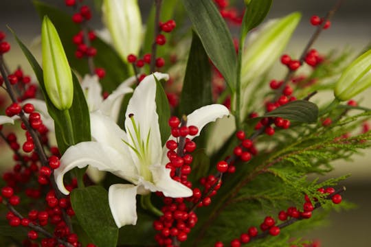 Ilex and Lily Christmas Vase Arrangement