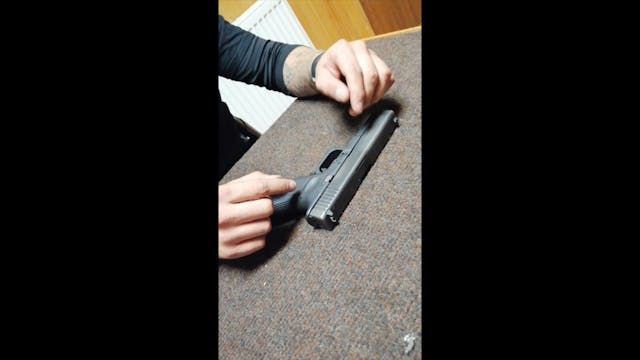 Dismantling Glock pistol