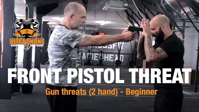 Front Two Handed Pistol Threat - High